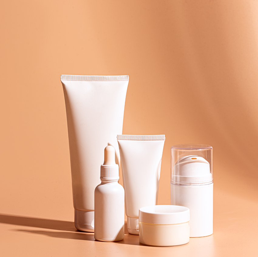 Woman applying skincare serum